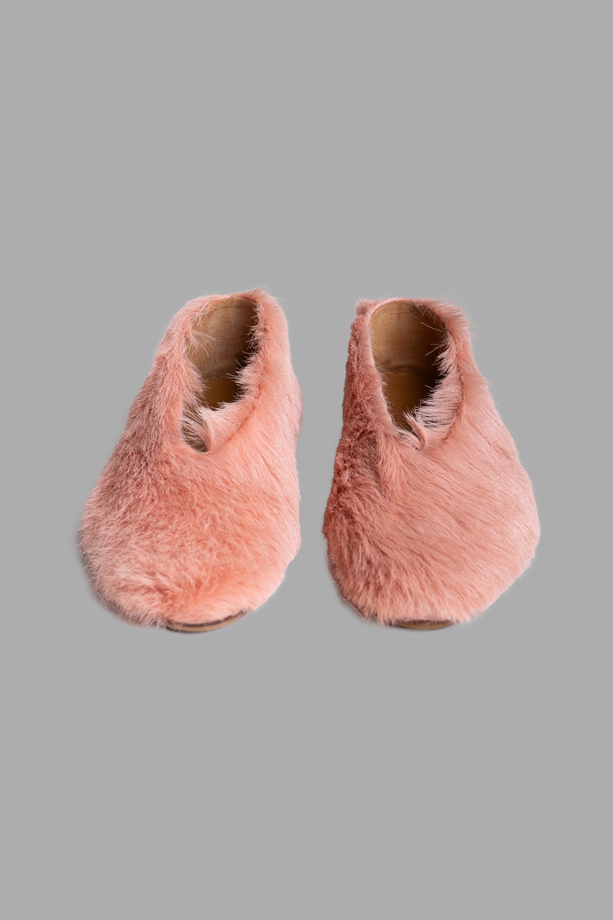 By Malene Birger Merina Leather Flats in pink, highlighting the textured finish and elegant pointy toe, captured from an.