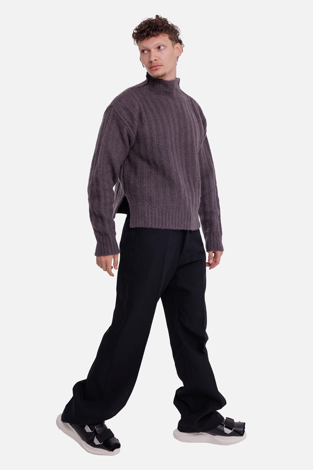 MSGM men's tailored trousers in black, full-length on-model view with relaxed straight leg and pressed creases