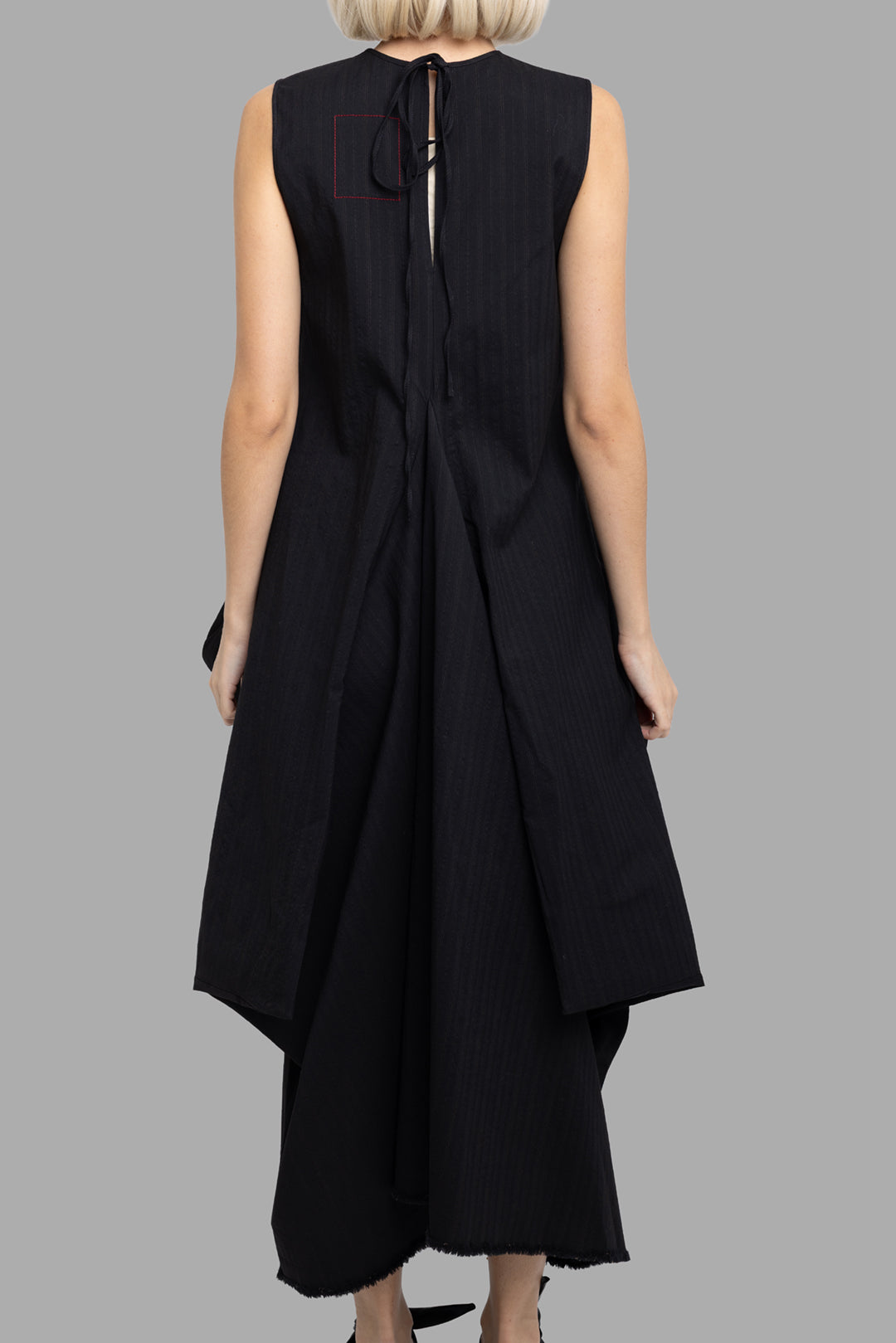 Uma Wang women's black Alani dress, back view with slit opening and long draped panels