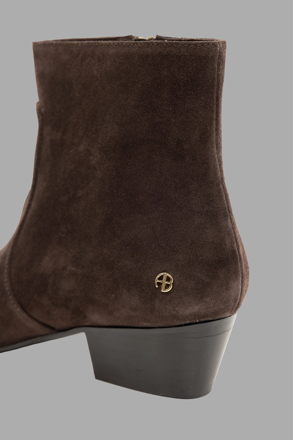 Anine Bing women's ankle boots in dark brown suede, logo detail, gold AB monogram at heel.