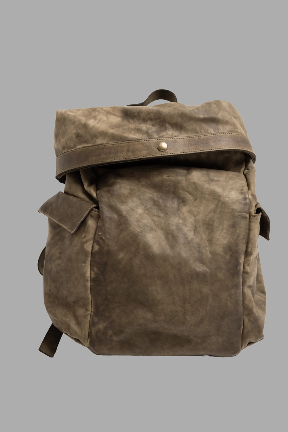 Shoto unisex leather rolltop backpack in dive khaki, front view with large flap pocket and soft washed texture