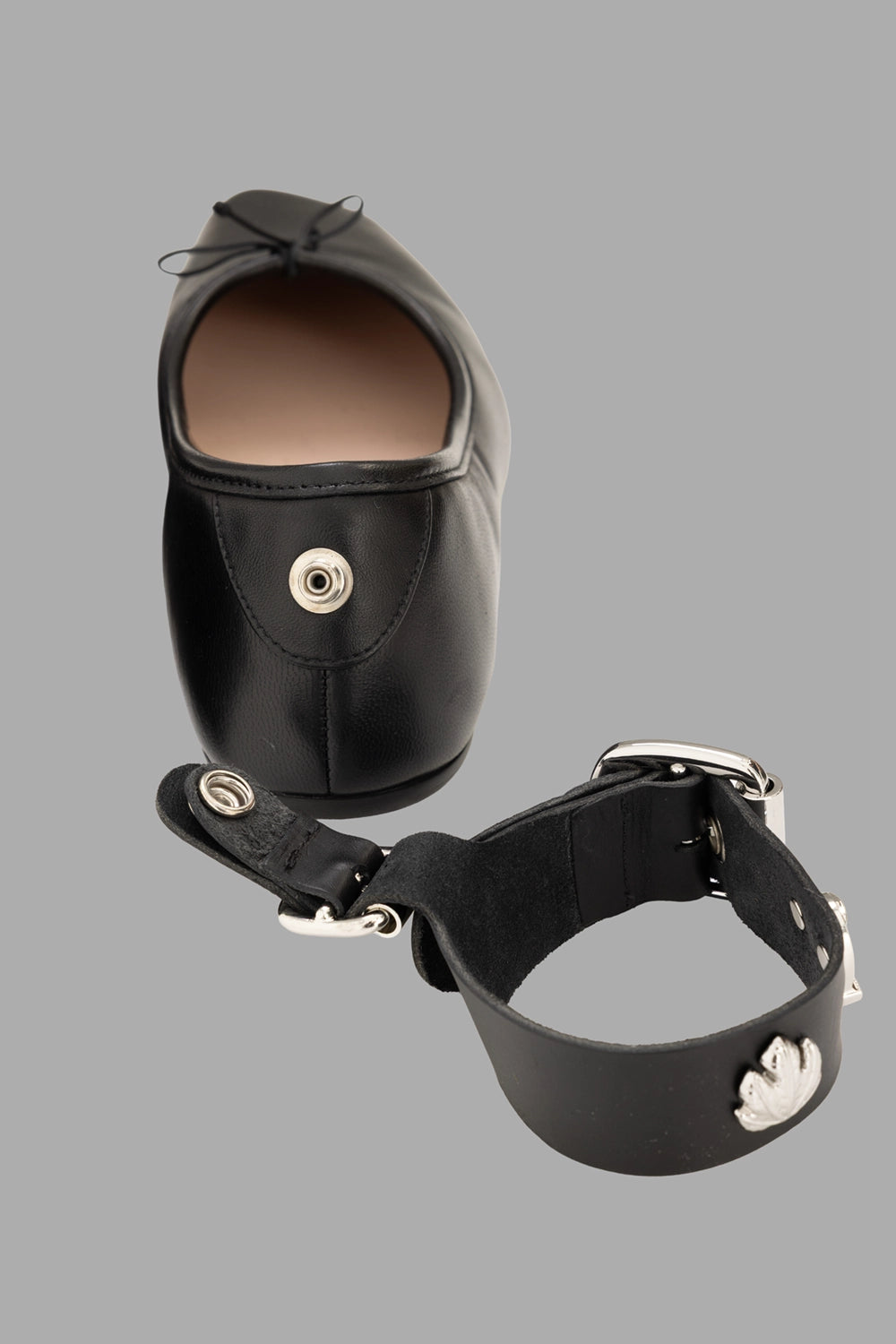 Vivienne Westwood women ballerina flats in black, heel detail showing snap for detachable strap.