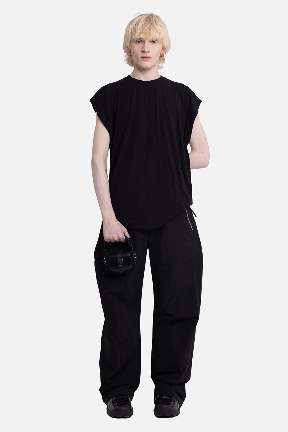 LA HAINE INSIDE US men's bamboo tank top in black, on-model full-length, diagonal seam and loose sleeveless shape