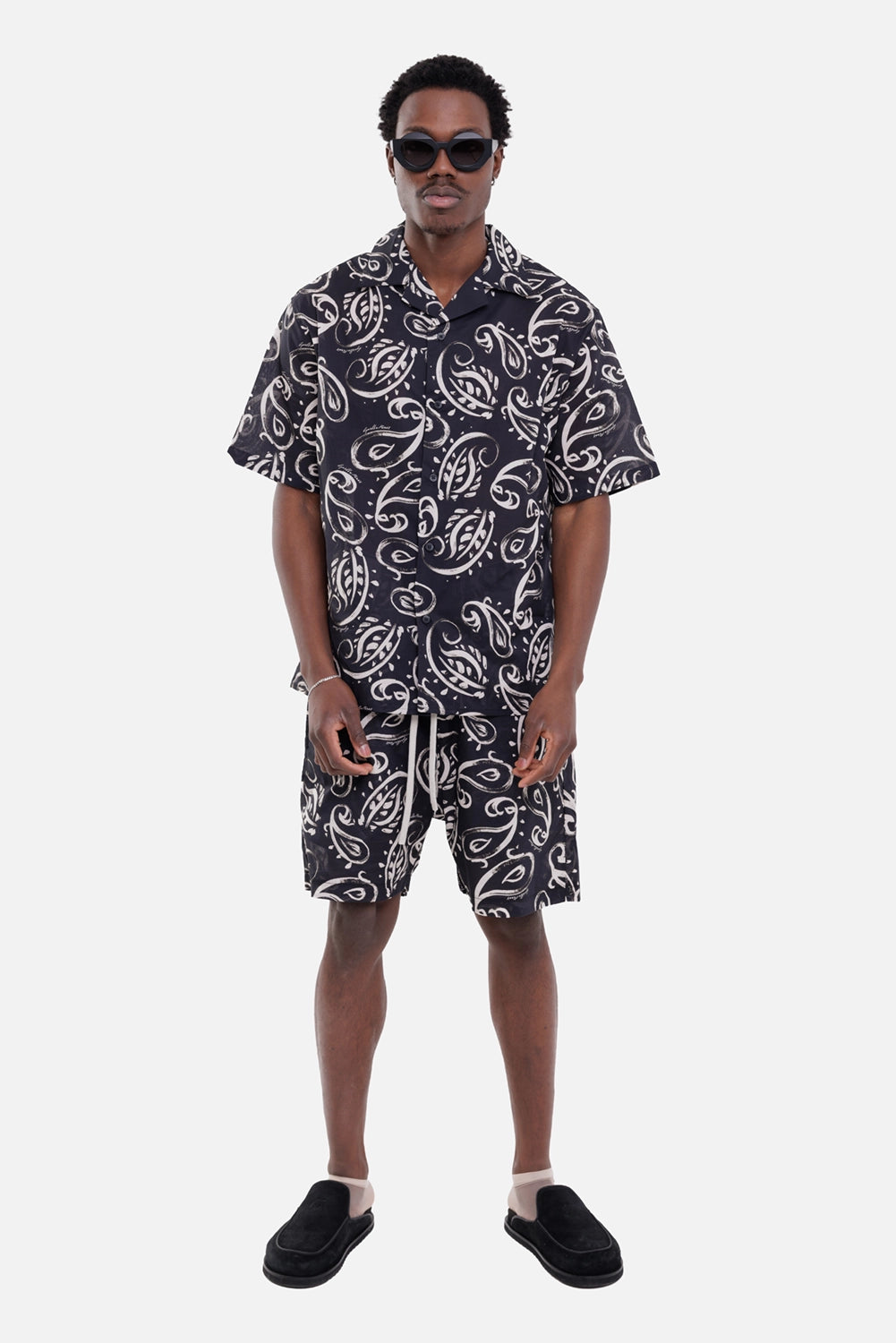 Gaëlle Paris men's bowling shirt in black, on-model full-length, cream bandana print and short sleeves