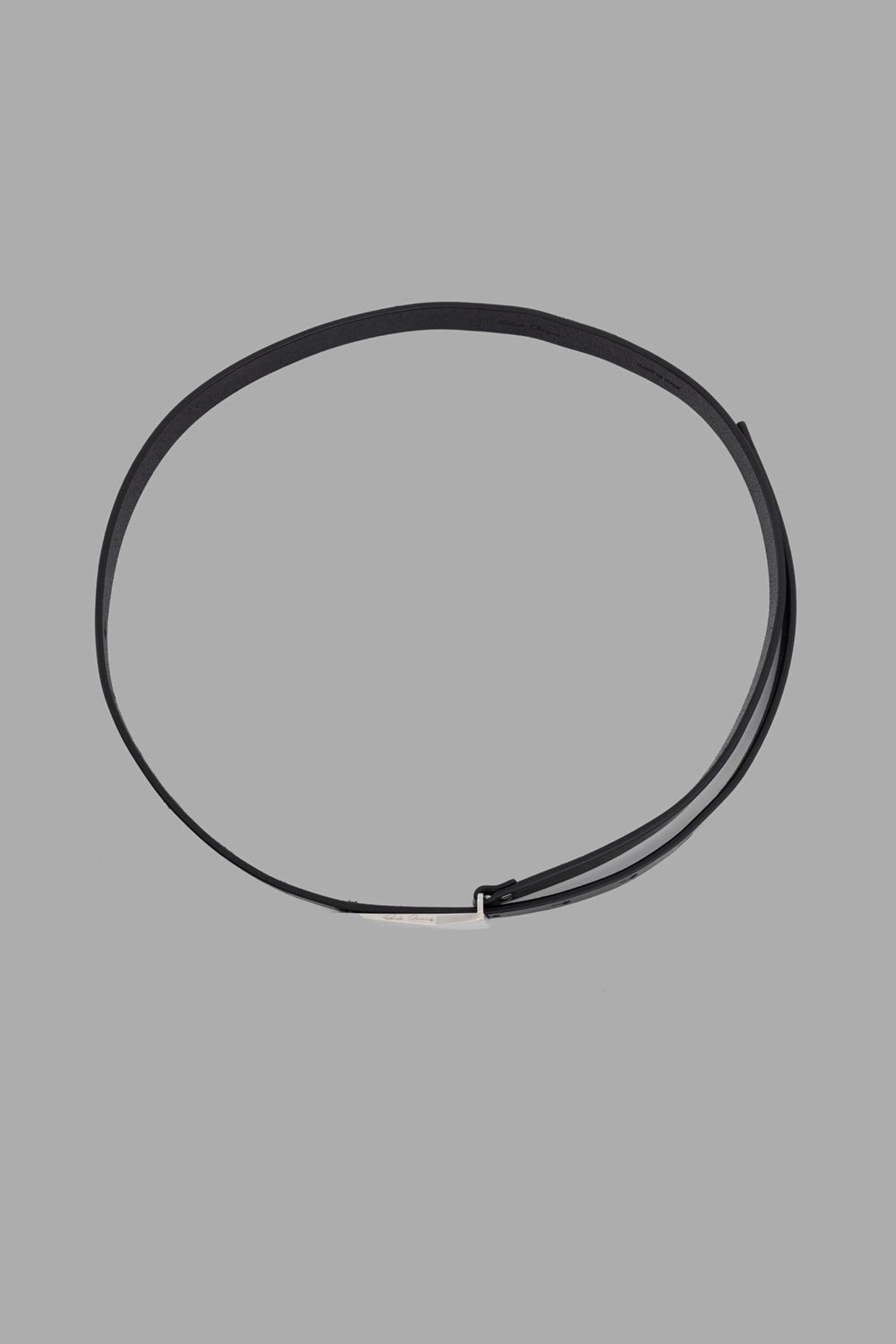Rick Owens belt in black, front view, slim 2 cm strap formed in a circle