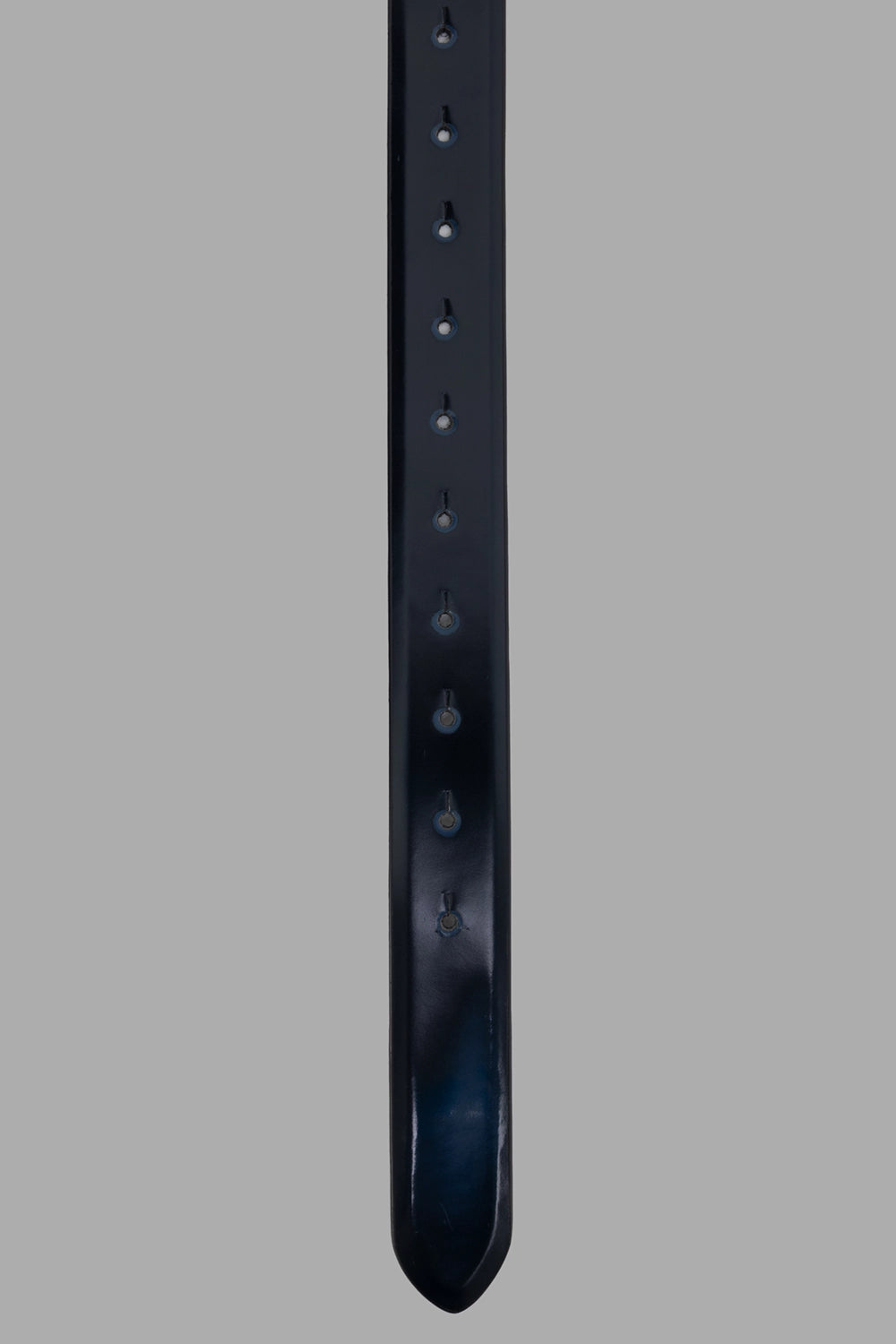 Marsèll leather belt in blue, three-quarter view, tapered tip detail