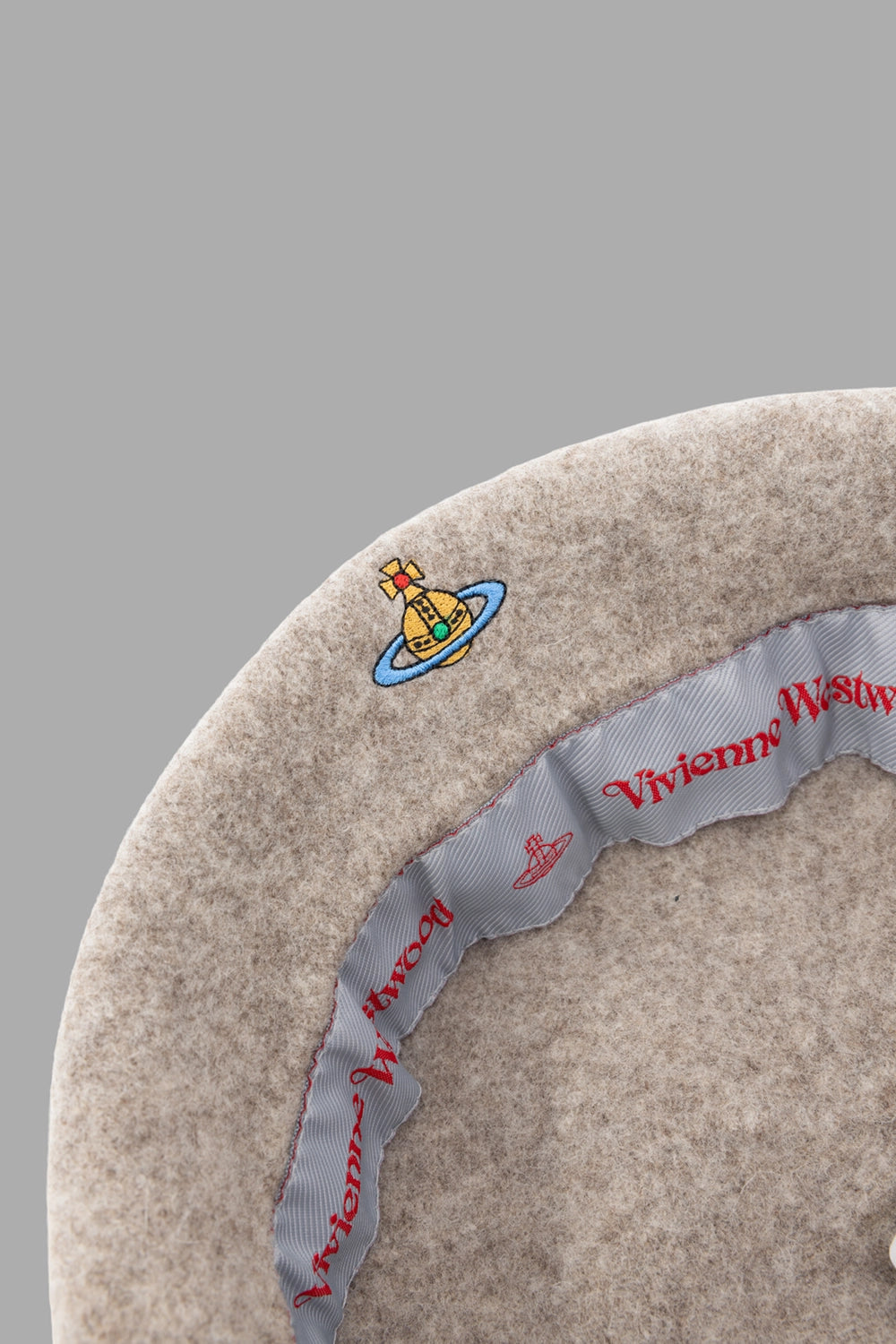 Vivienne Westwood beret in mocha, close-up of Orb embroidery on felted wool