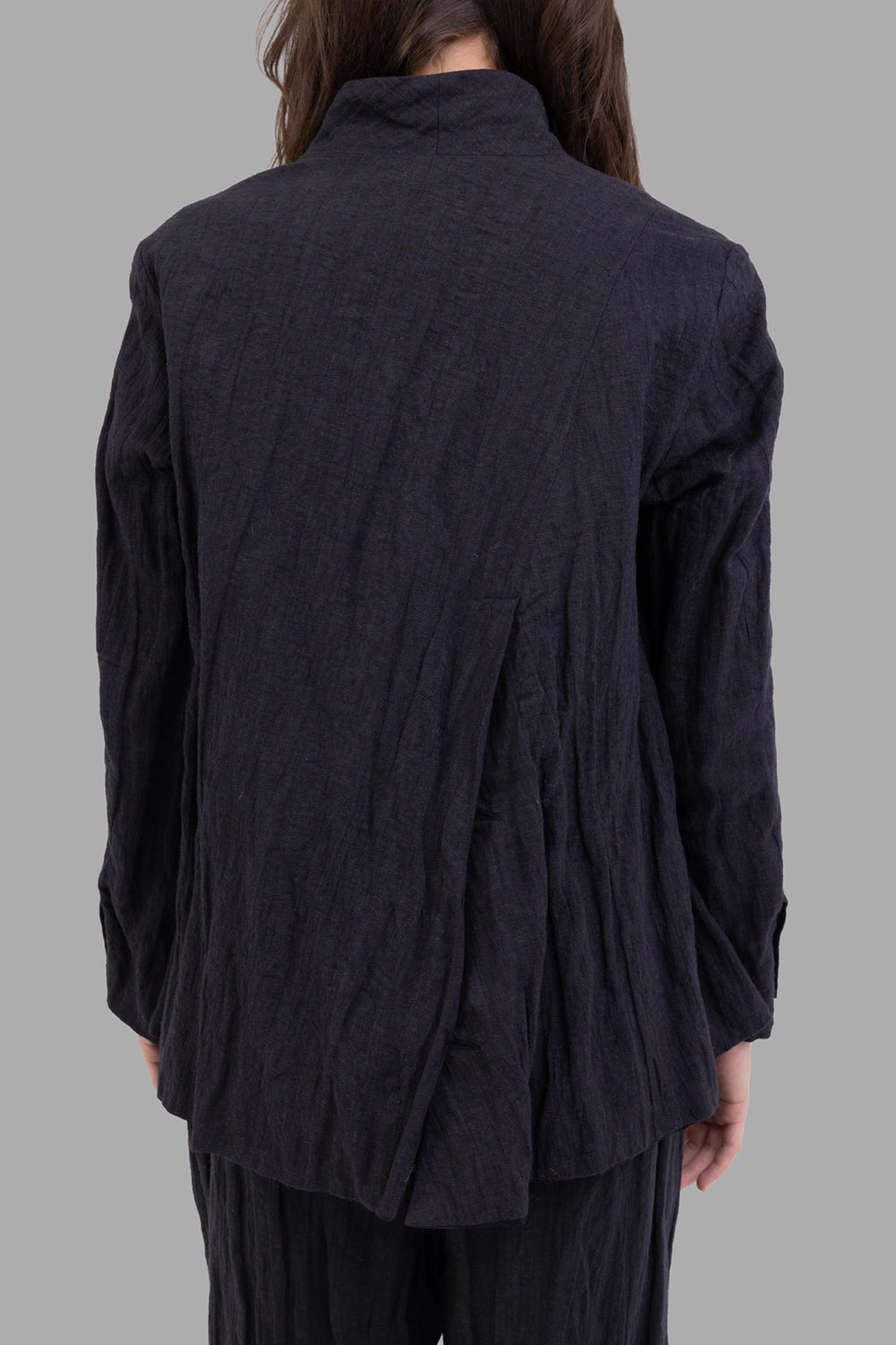 Marc Point women's blazer in black, back view, asymmetric layered vent and crinkled fabric