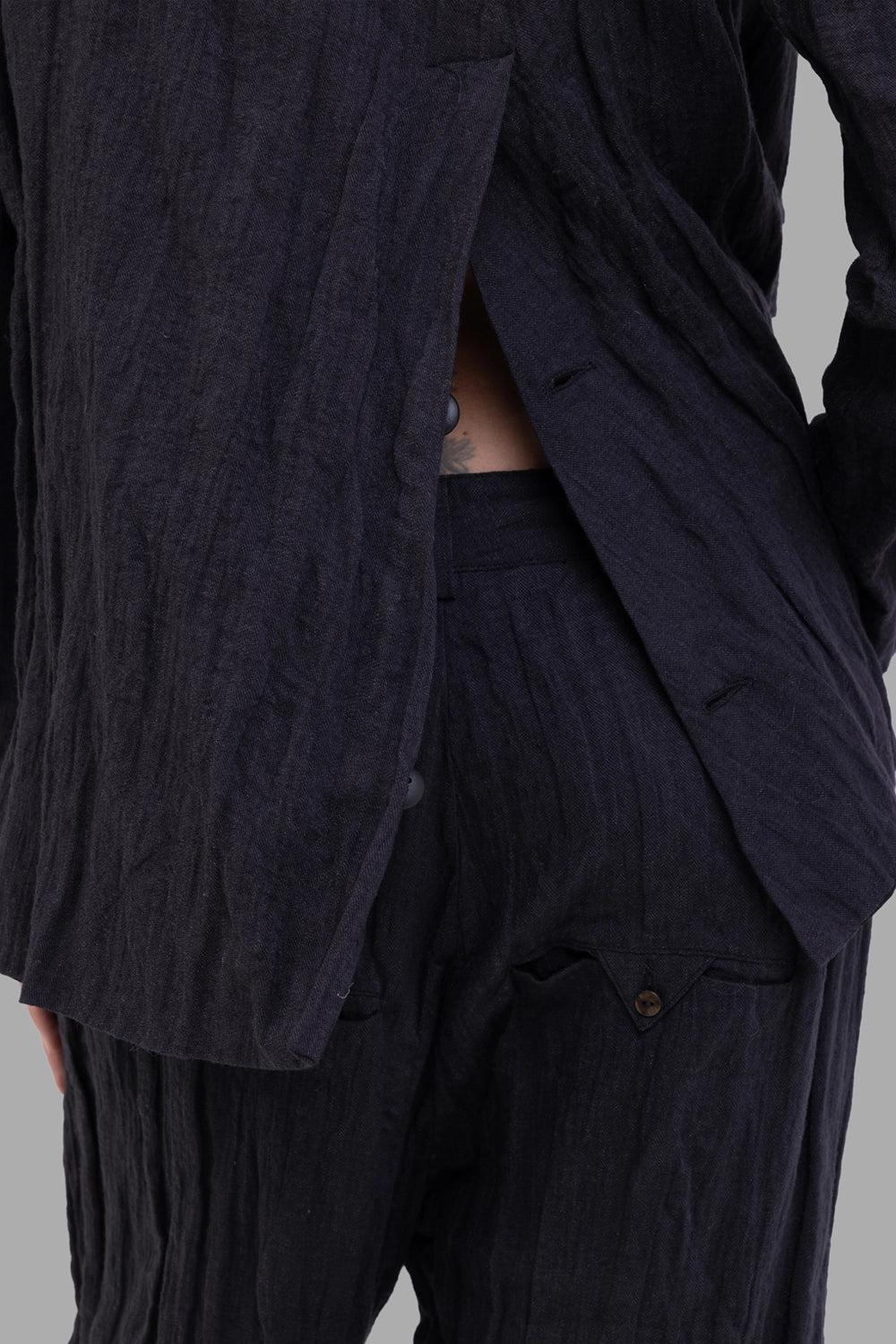 Marc Point women's blazer in black, back-vent detail with overlapping panels