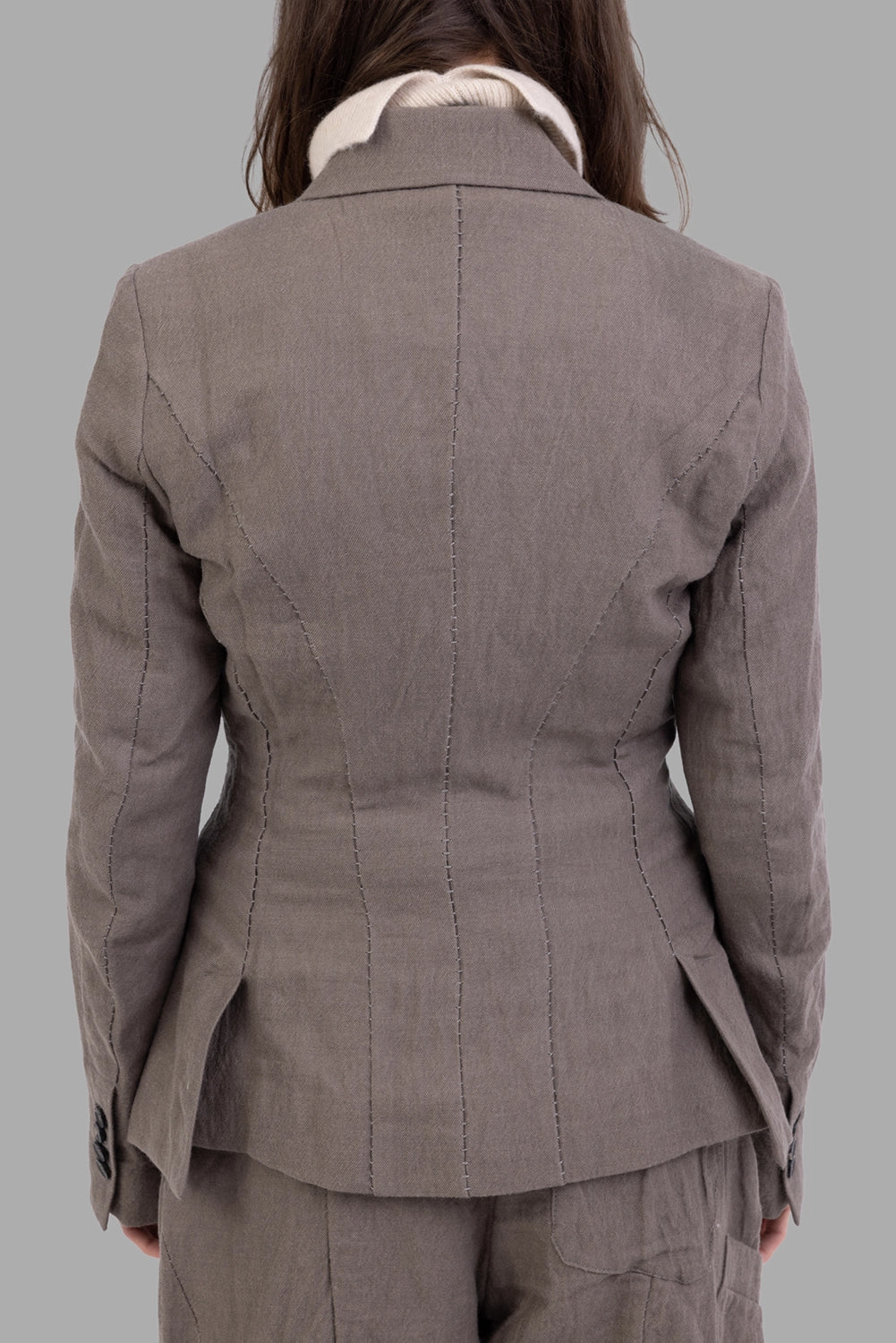 Masnada women’s blazer in dust, back view, scar-stitched seams and twin vents