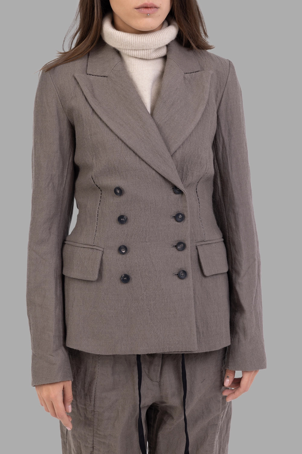 Masnada women’s blazer in dust, front view, peak lapels, eight horn buttons and flap pockets