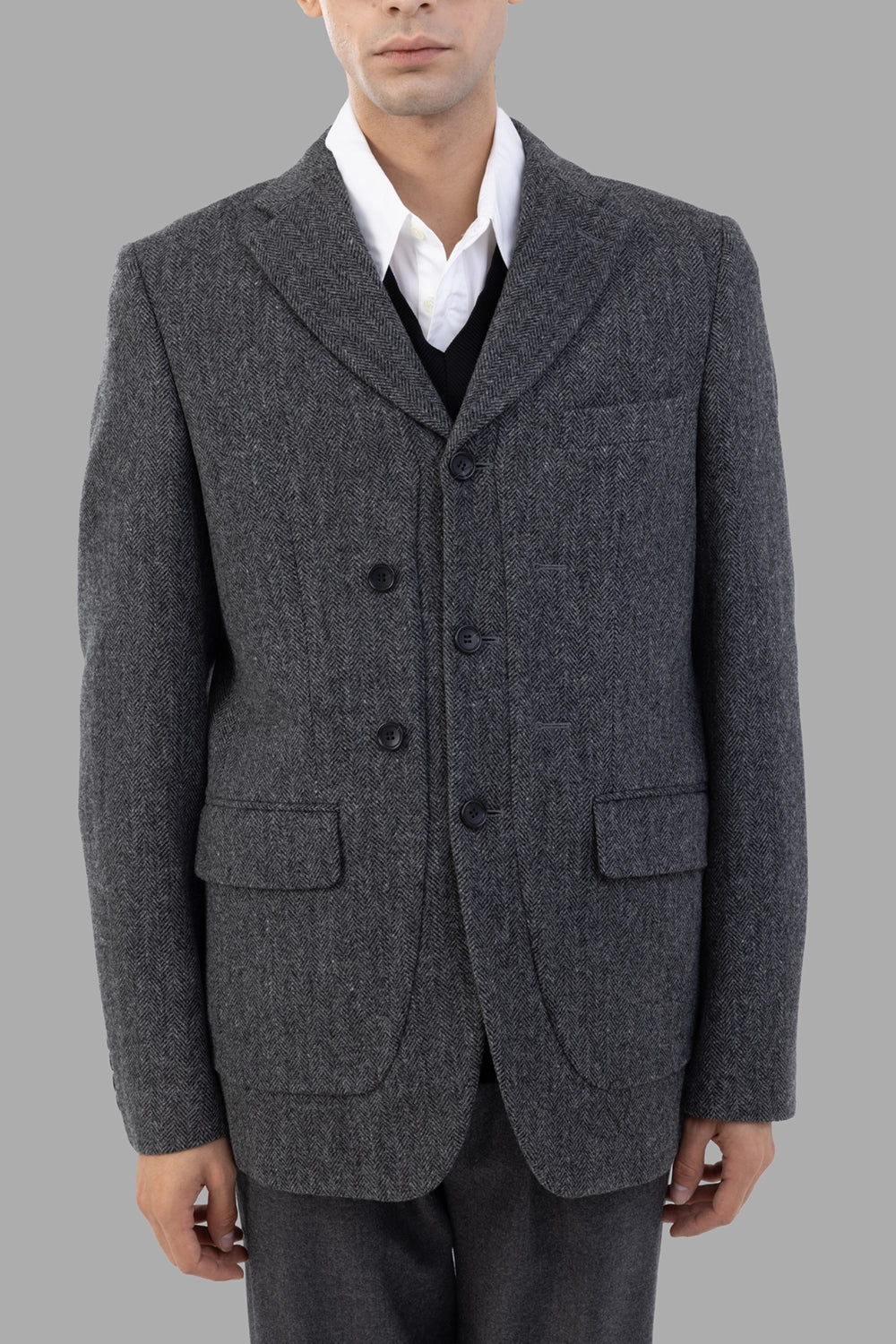 Comme des Garçons blazer in grey herringbone, front view, notched lapel and chest pocket