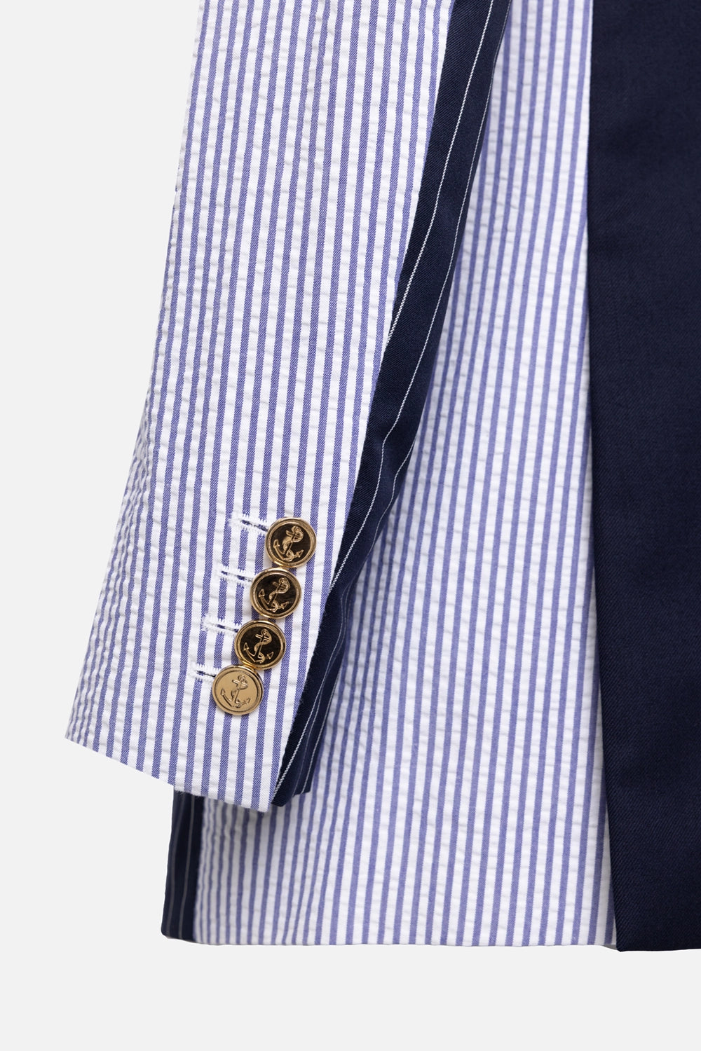Pre-owned Thom Browne women's blazer in navy, cuff close-up, striped sleeve with gold anchor buttons