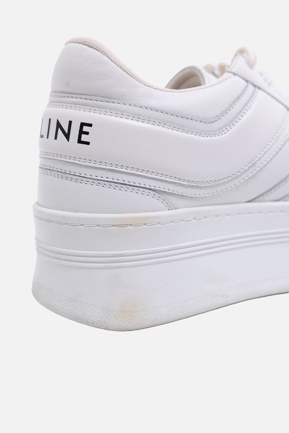 Pre-owned Celine block sneakers in white, heel detail view, logo heel tab and platform edge