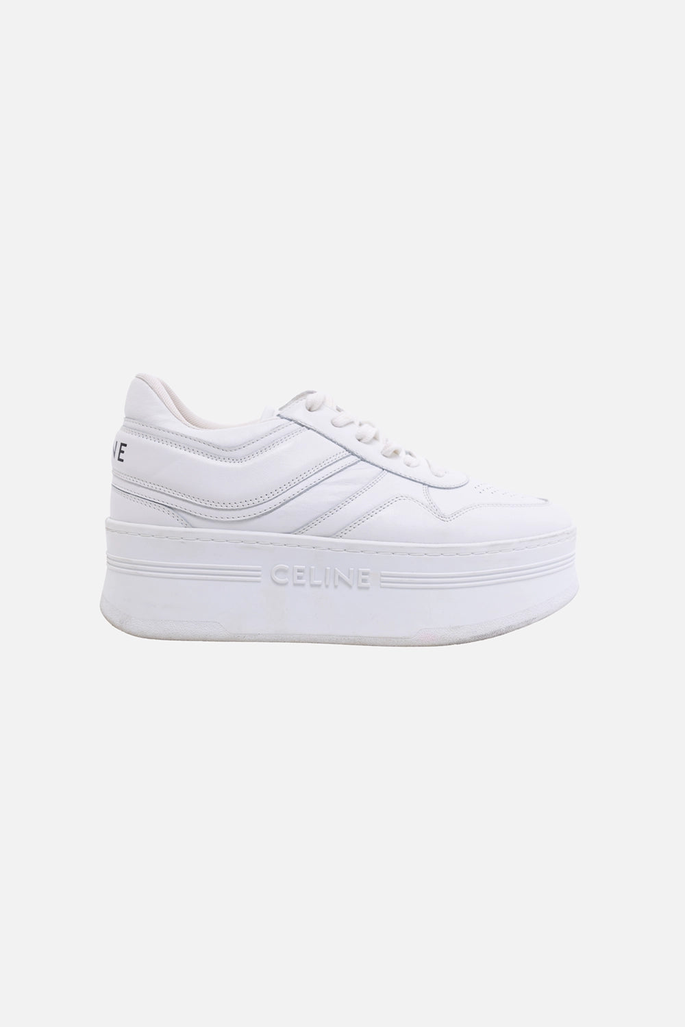 Pre-owned Celine women's block sneakers in white, side view, wedge platform sole with embossed lettering