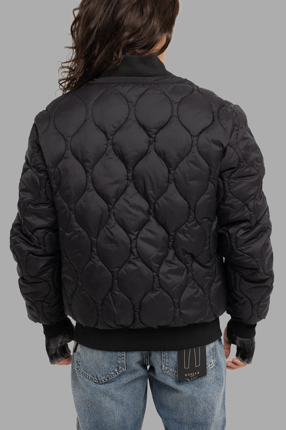 Gaëlle Paris men's bomber jacket in black, back view, onion quilting and rib hem