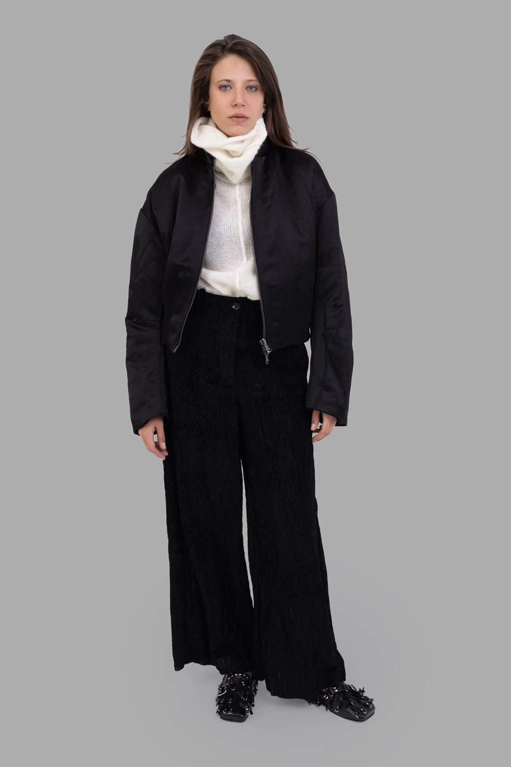 Masnada women's reversible bomber jacket in black/multicolor, on-model full length, drop shoulders and two-way zip