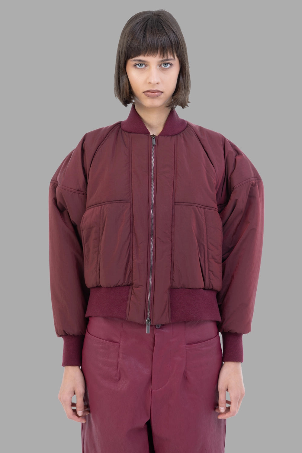Gentryportofino women's bomber jacket in Borgogna, full-length on model, oversized cocoon fit with ribbed hem and cuffs.