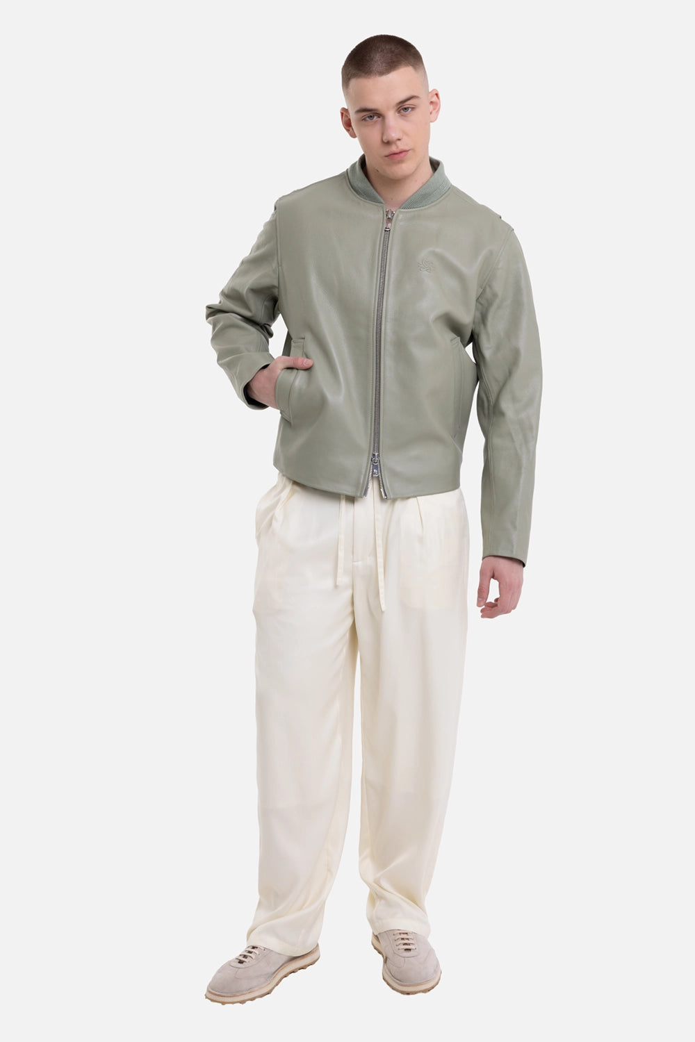 Filling Pieces unisex leather bomber jacket in tea, on-model full-length view, embossed chest logo and side pockets