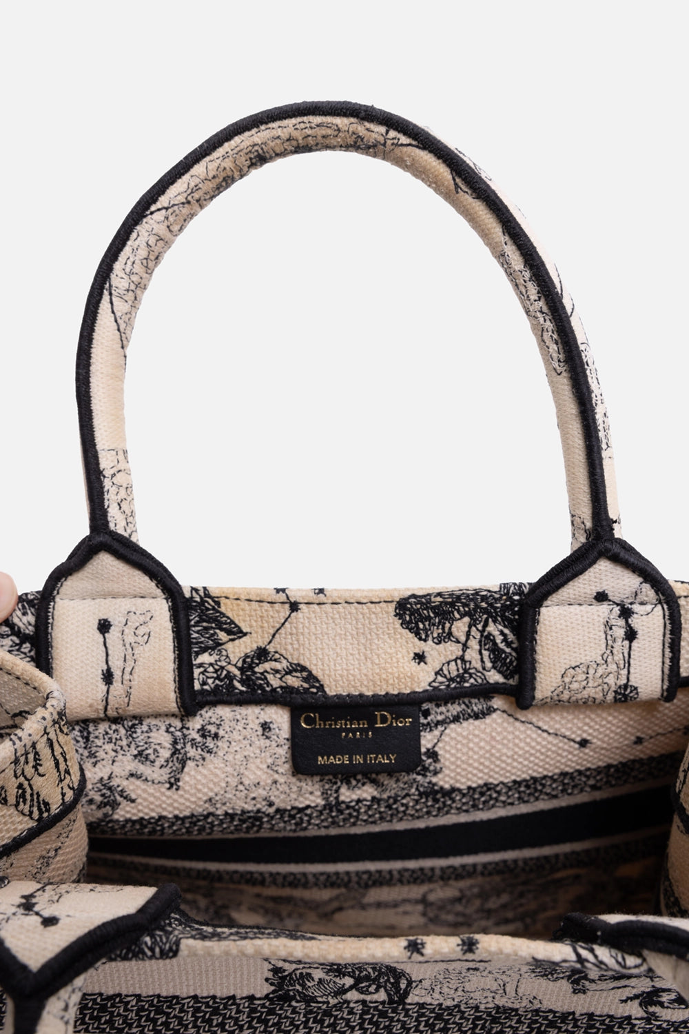 Pre-owned Dior women's book tote in latte and black, label detail, interior Made in Italy tag under top handle
