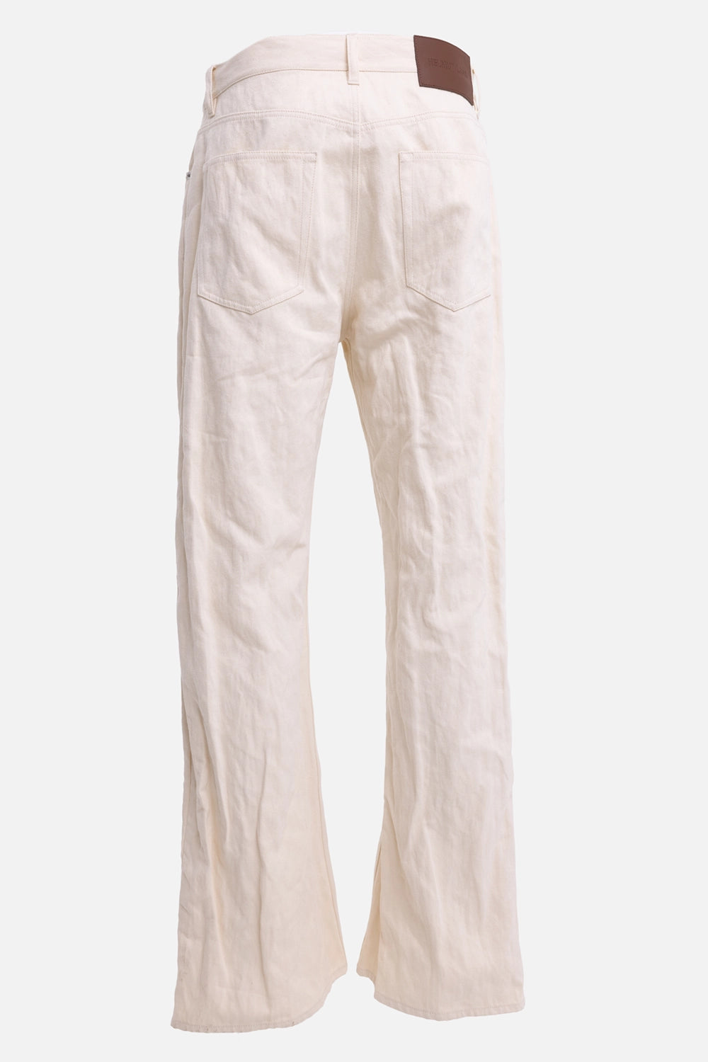 Helmut Lang men's bootcut jeans in muslin, back view, brown leather logo patch and rear patch pockets