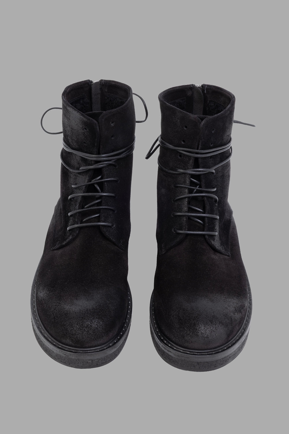 Marsèll boots in black, 3/4 view, five-eyelet lacing and rounded toe in reversed leather