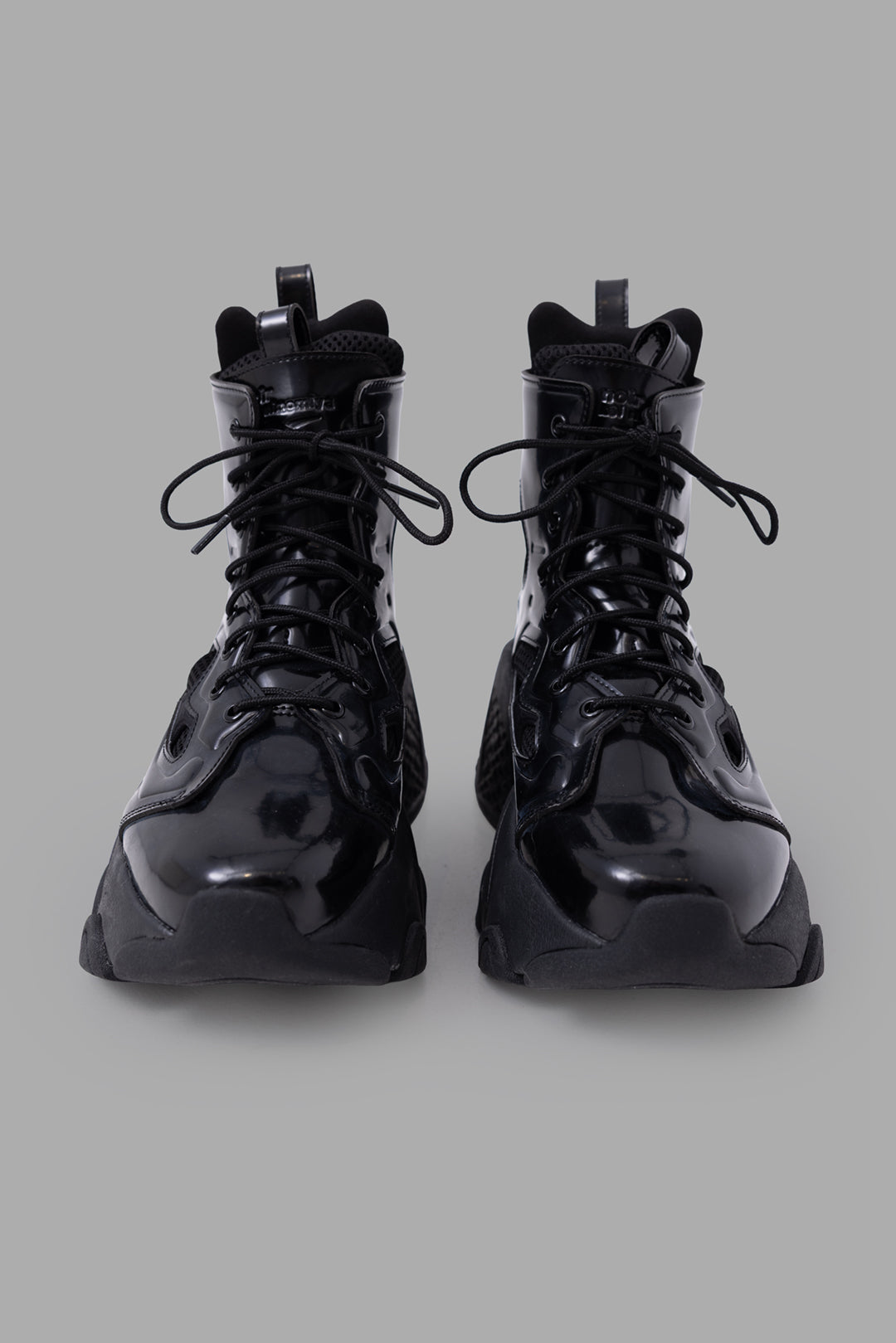 Noir Kei Ninomiya x Reebok unisex Fury Boot Hi in black, front view with glossy toe and lace-up upper