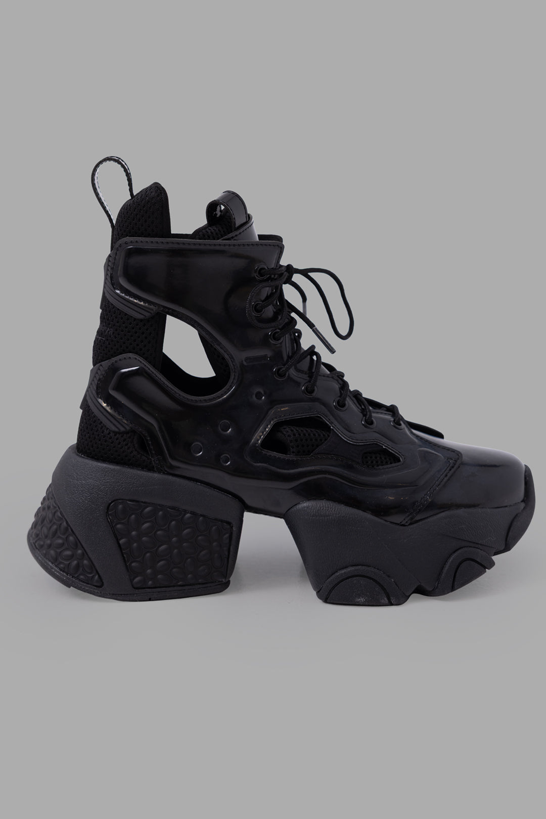 Noir Kei Ninomiya x Reebok unisex Fury Boot Hi in black, side view with cut-out cage and chunky platform sole