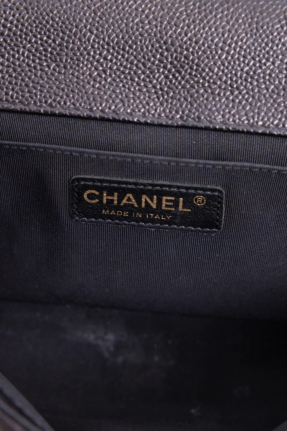 Pre-owned Chanel women's Boy Bag in black, label detail, interior brand patch stamped Made in Italy