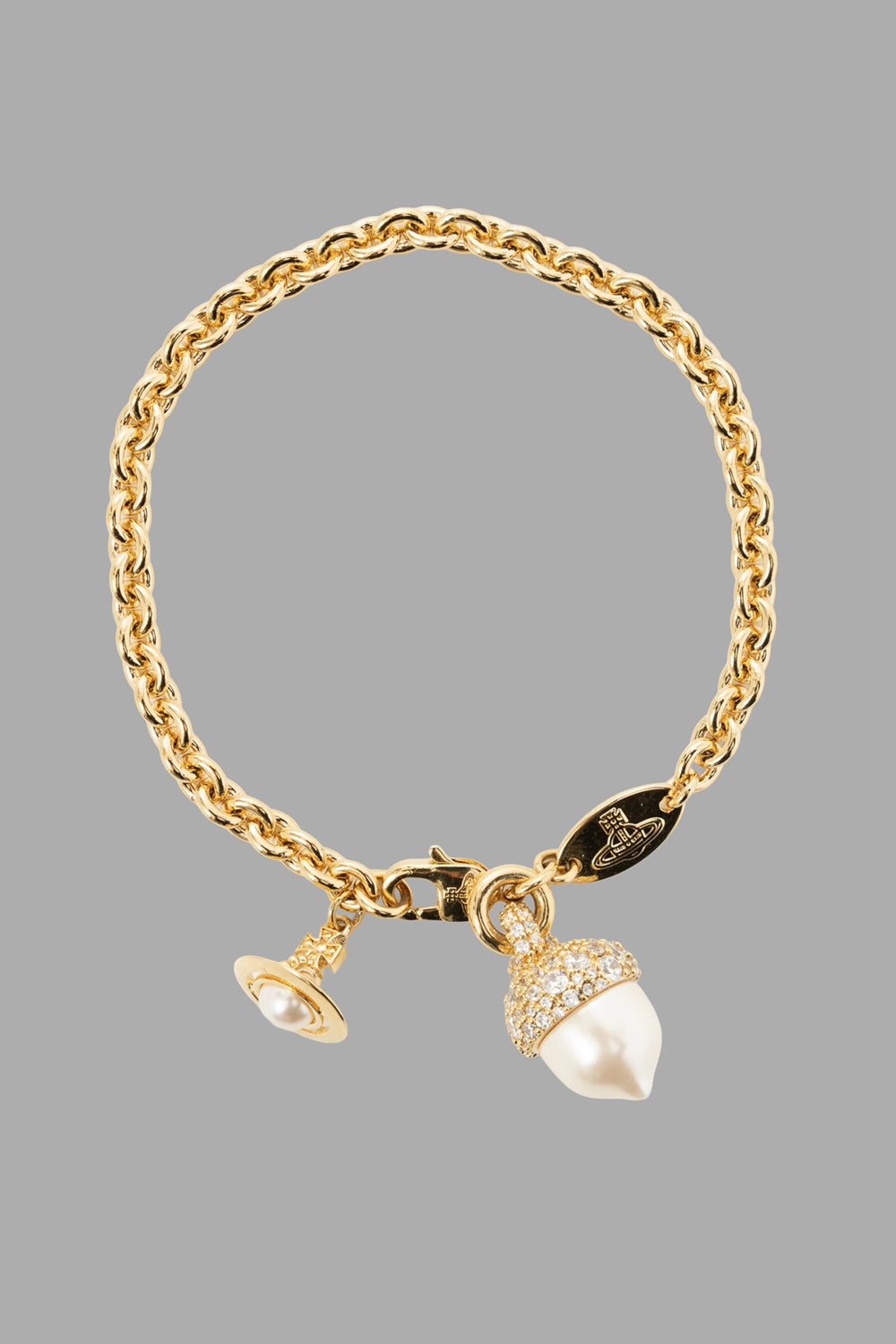 Vivienne Westwood women’s bracelet in gold, front view, pavé acorn charm and pearl orb charm on rope chain