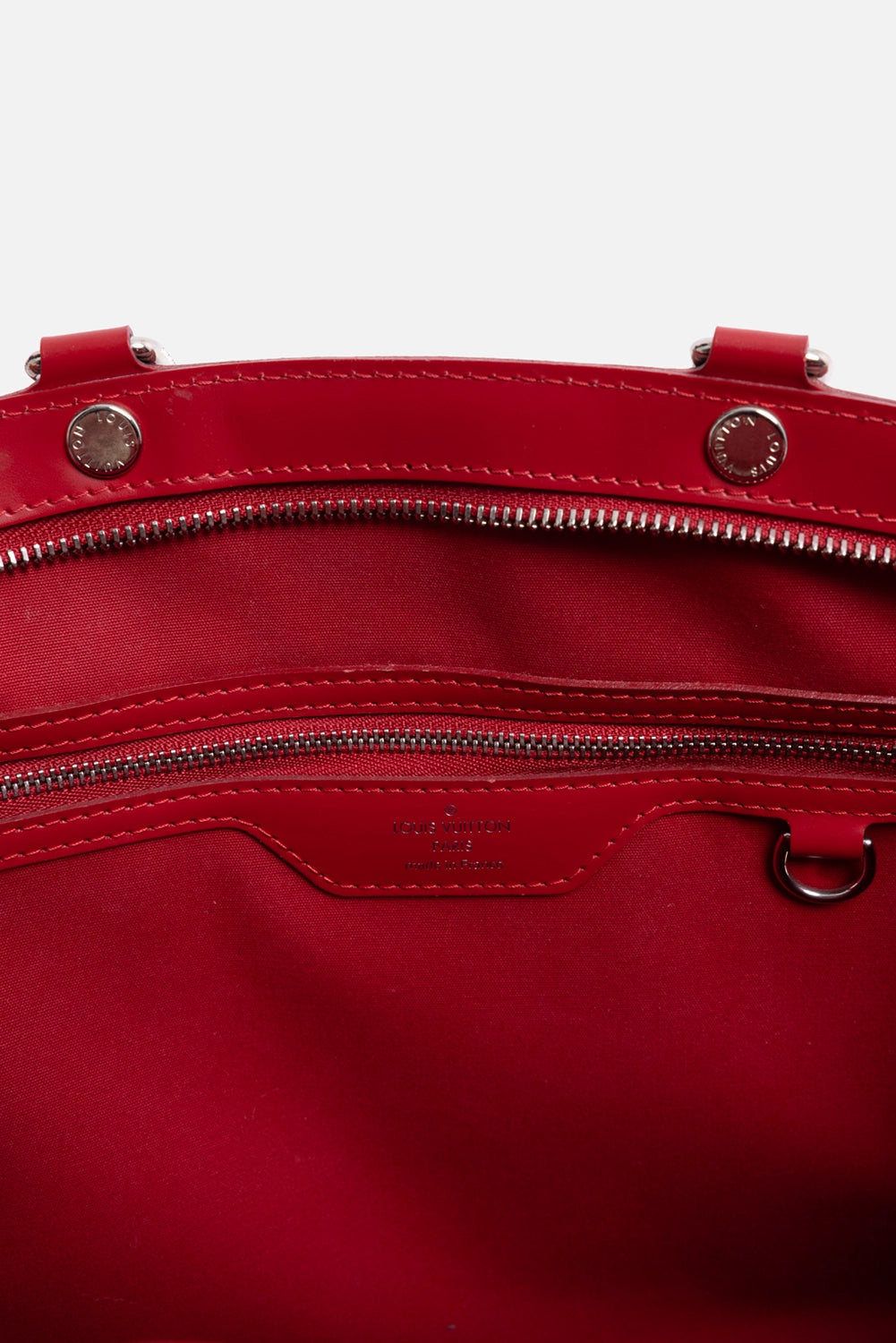 Pre-owned Louis Vuitton Brea MM satchel in red, logo detail inside, double-zip opening and embossed stamp.