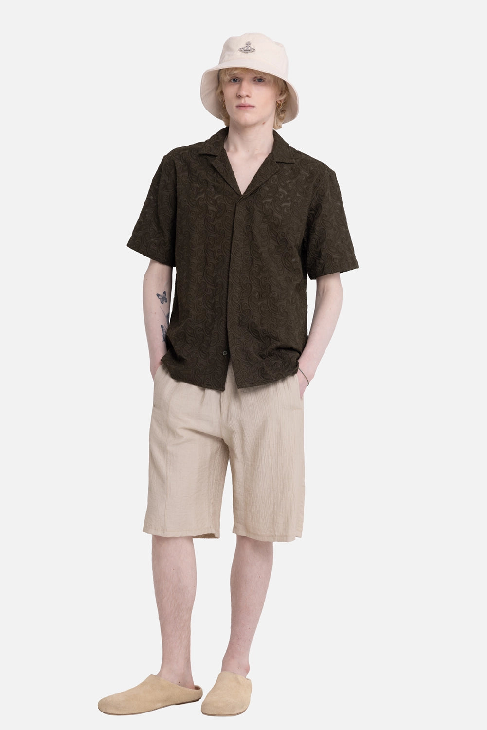 Orlebar Brown men's shirt in Bayleaf Green, on-model full length, paisley broderie texture