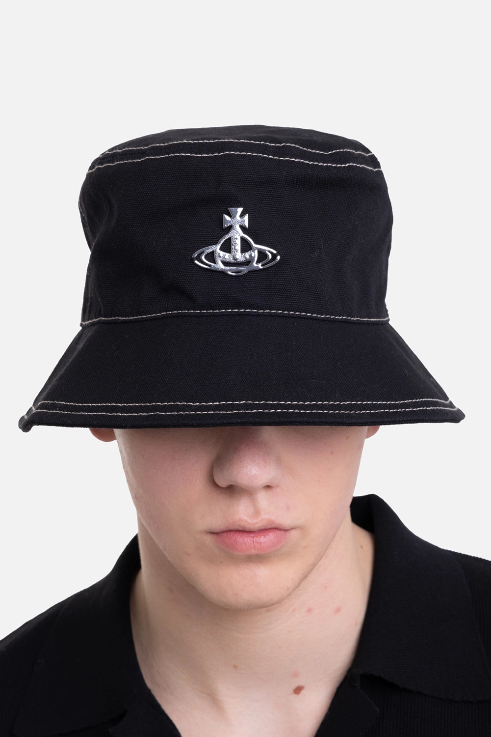 Vivienne Westwood men's bucket hat in black, front view with silver Orb plaque and contrast stitching