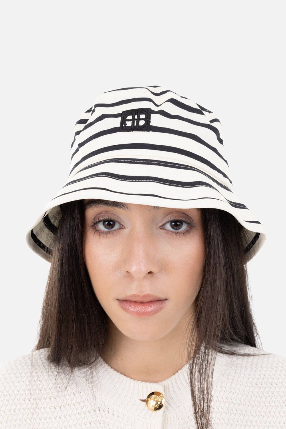 Anine Bing women's bucket hat in black stripe, on-model half length, embroidered AB monogram patch