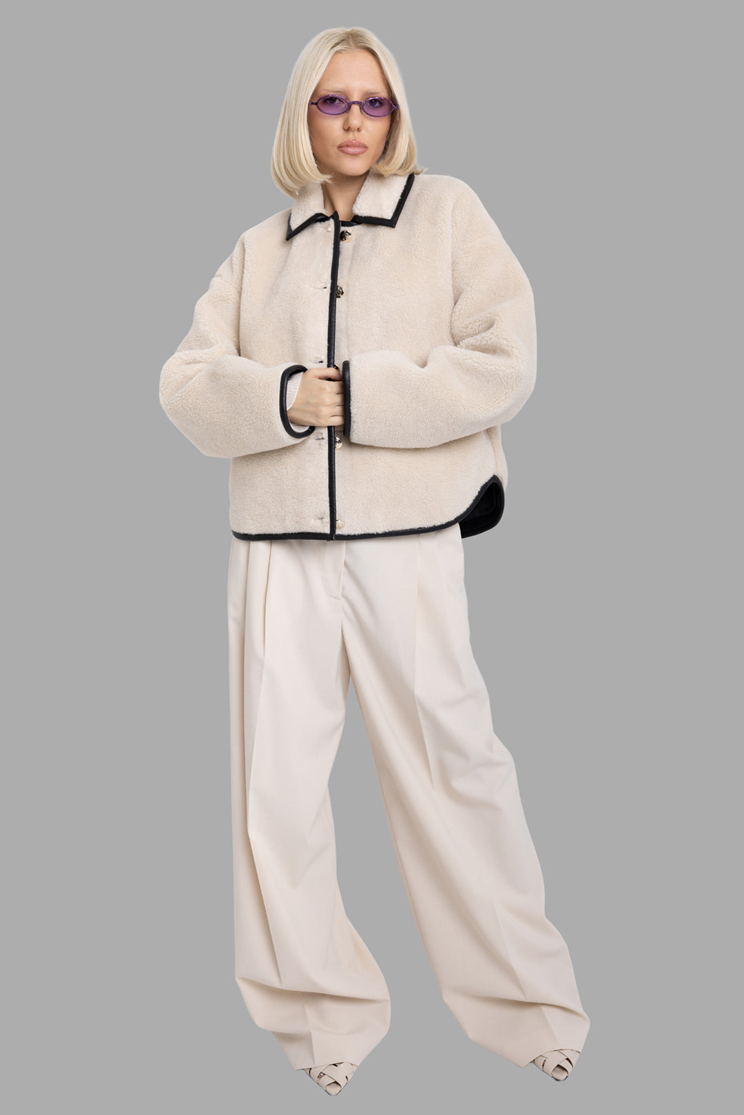 Anine Bing women's cream Camden teddy jacket, full-length on-model view with boxy fit and contrast black piping.