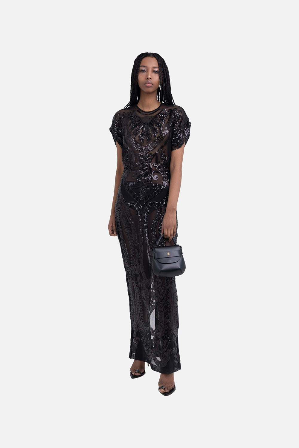 Norma Kamali women's long dress in black, on-model full-length, cap sleeves with semi-sheer sequin mesh
