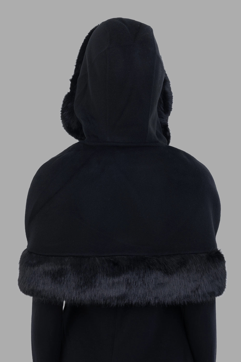 By Malene Birger women cape in black, back view, hood up with smooth wool finish.