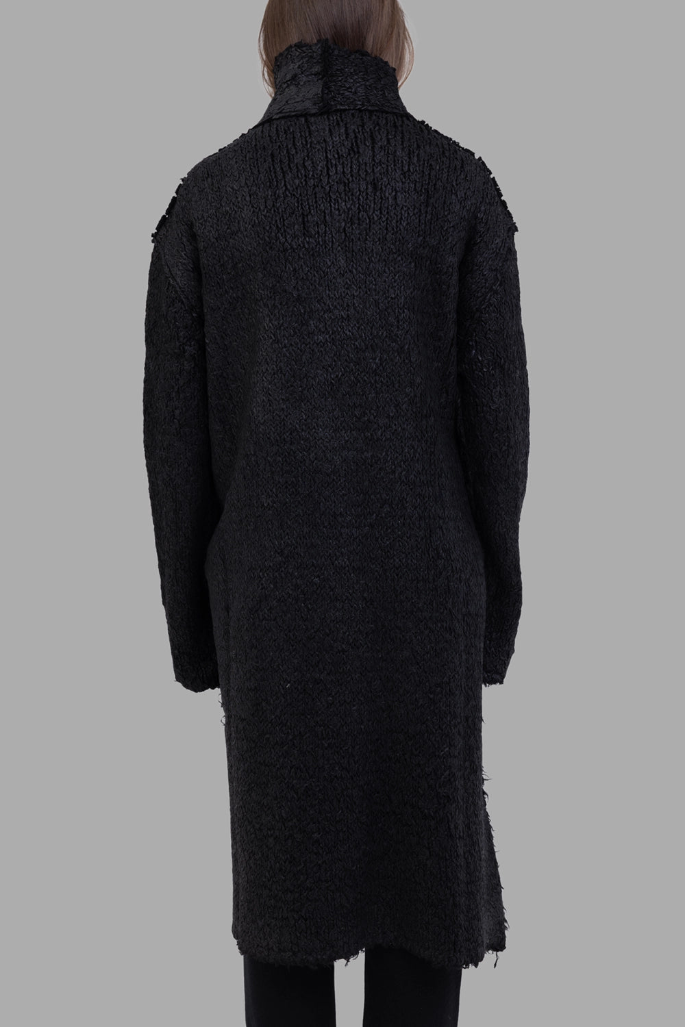 Masnada women knit cardigan in black, back view, raised collar seam, center back seam and raw hem