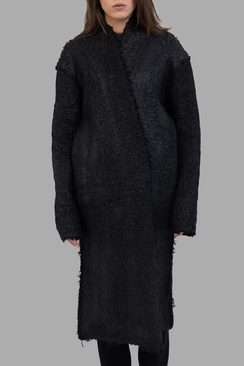 Masnada women knit cardigan in black, front view, asymmetric wrap seam and looped bouclé knit