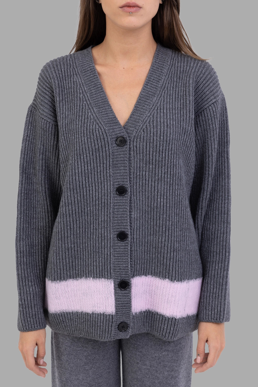 MSGM women cardigan in grey melange, front view, V-neck button front and ribbed texture with pink band.