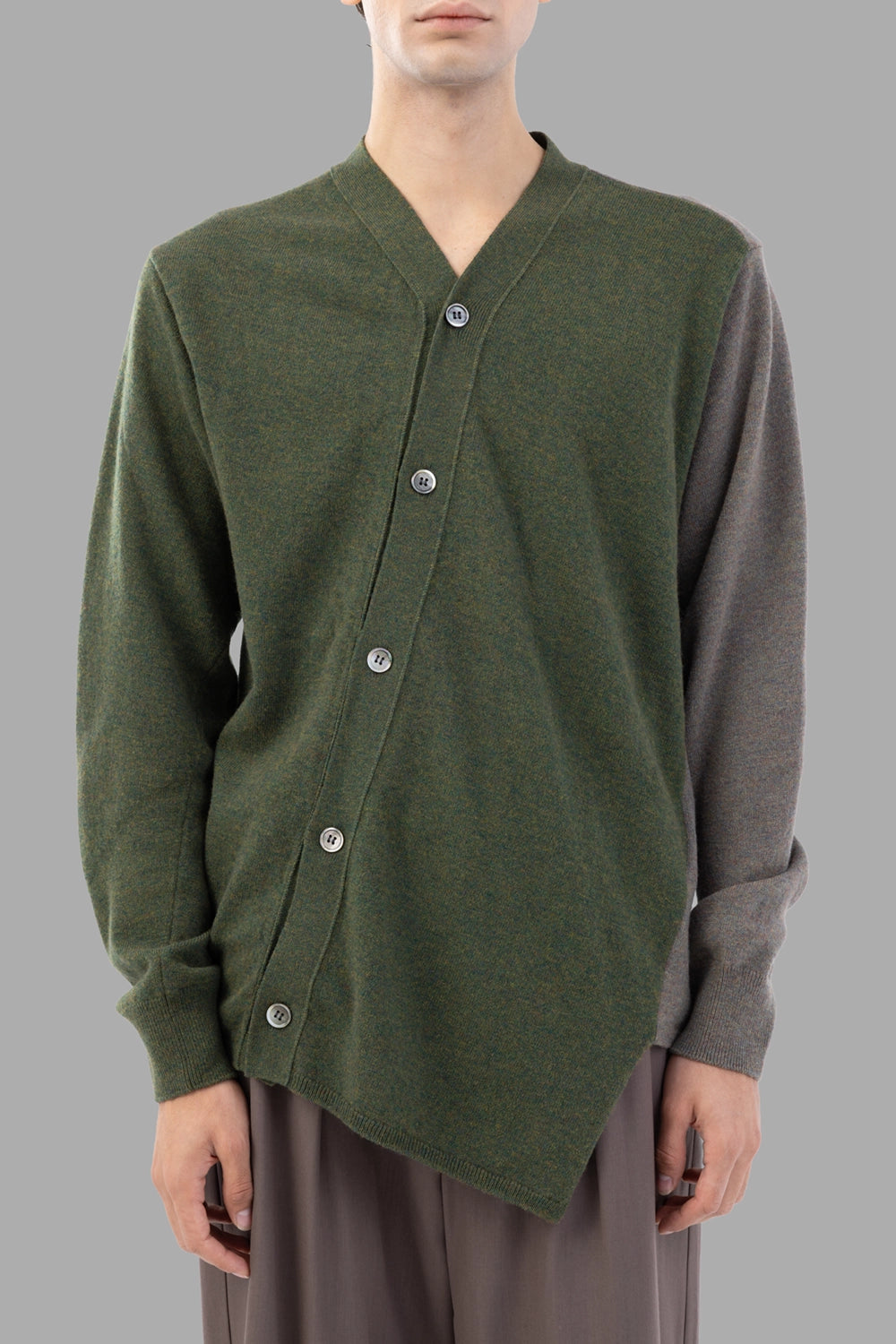 Comme des Garçons cardigan two-tone, back view, contrast colouring across shoulders and sleeves