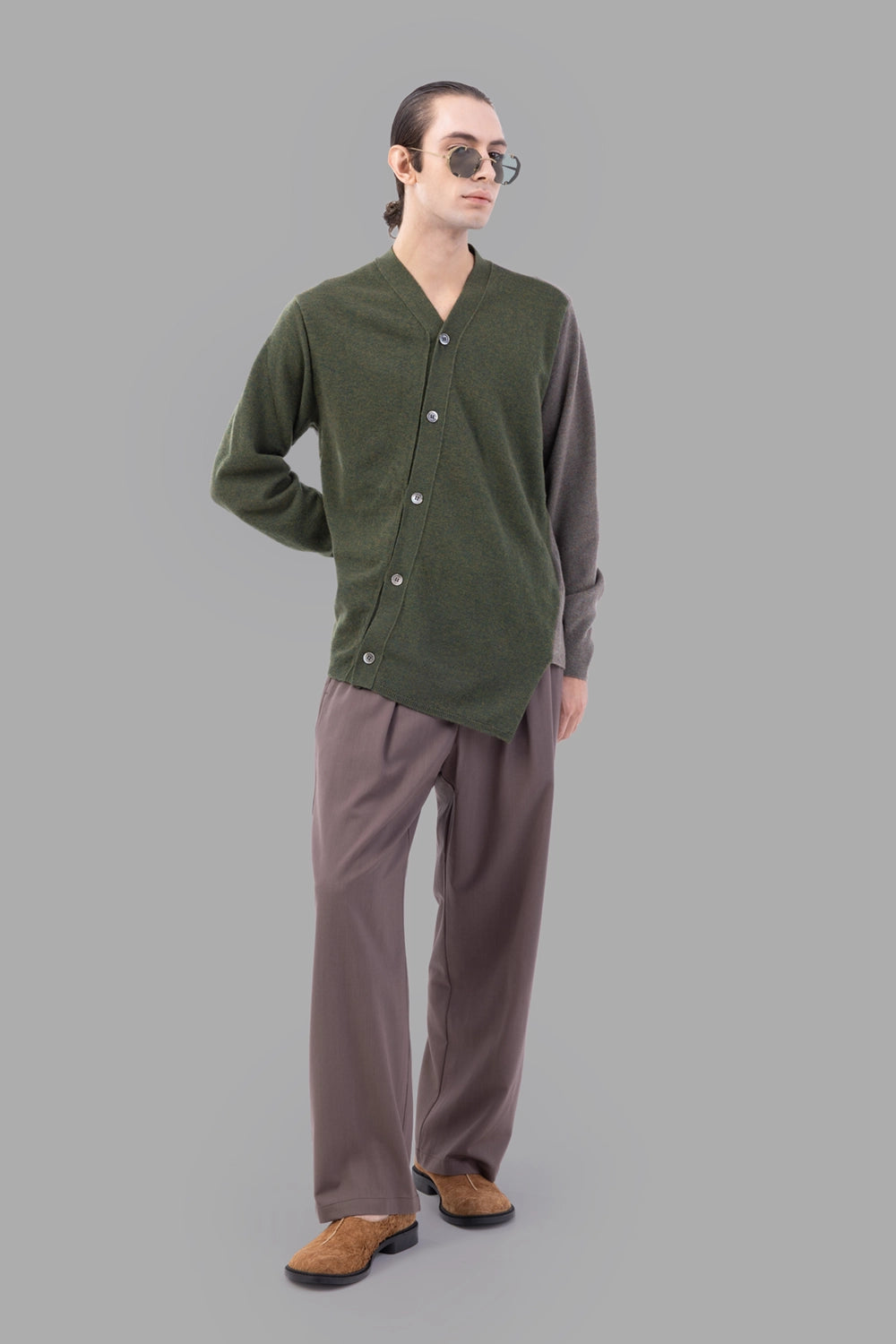 Comme des Garçons cardigan two-tone, full-length view, asymmetrical front with visible buttons
