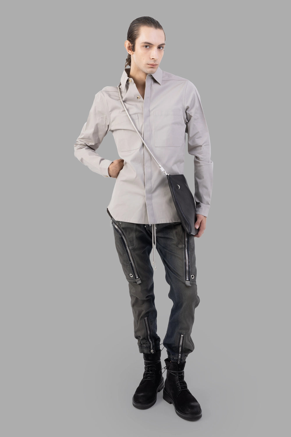 Rick Owens cargo pants in Darkdust Degrade, on-model full length, two-way ankle zips and elastic cuffs