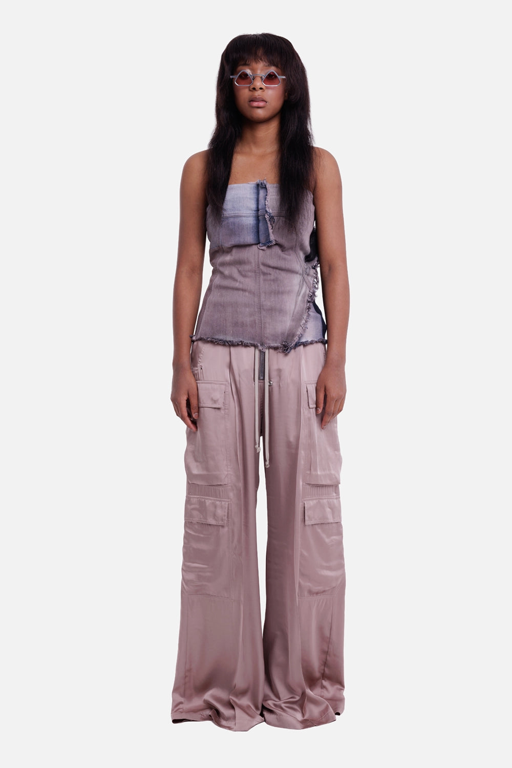 Rick Owens women's cargo trousers in rose, on-model full-length view, exposed zip and stacked flap cargo pockets.