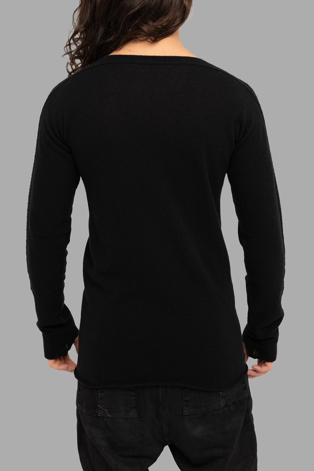 Isaac Sellam Experience men’s cashmere crewneck in black, back view, clean hem and lean silhouette.