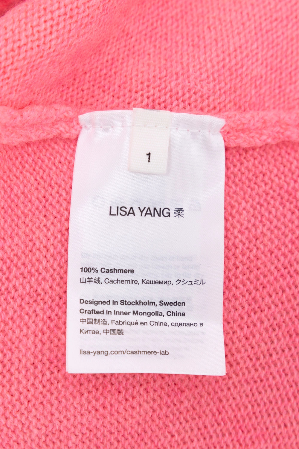 Pre-owned Lisa Yang cashmere polo sweater in pink, care label close-up, size 1 and 100% cashmere