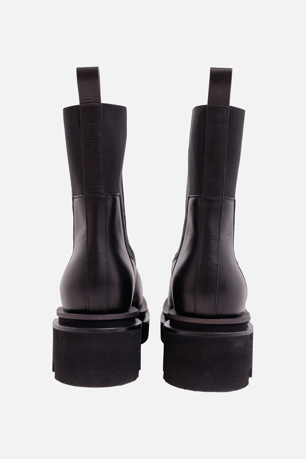 Rick Owens men's Chelsea boots in black, back view with leather pull tabs and squared block heels