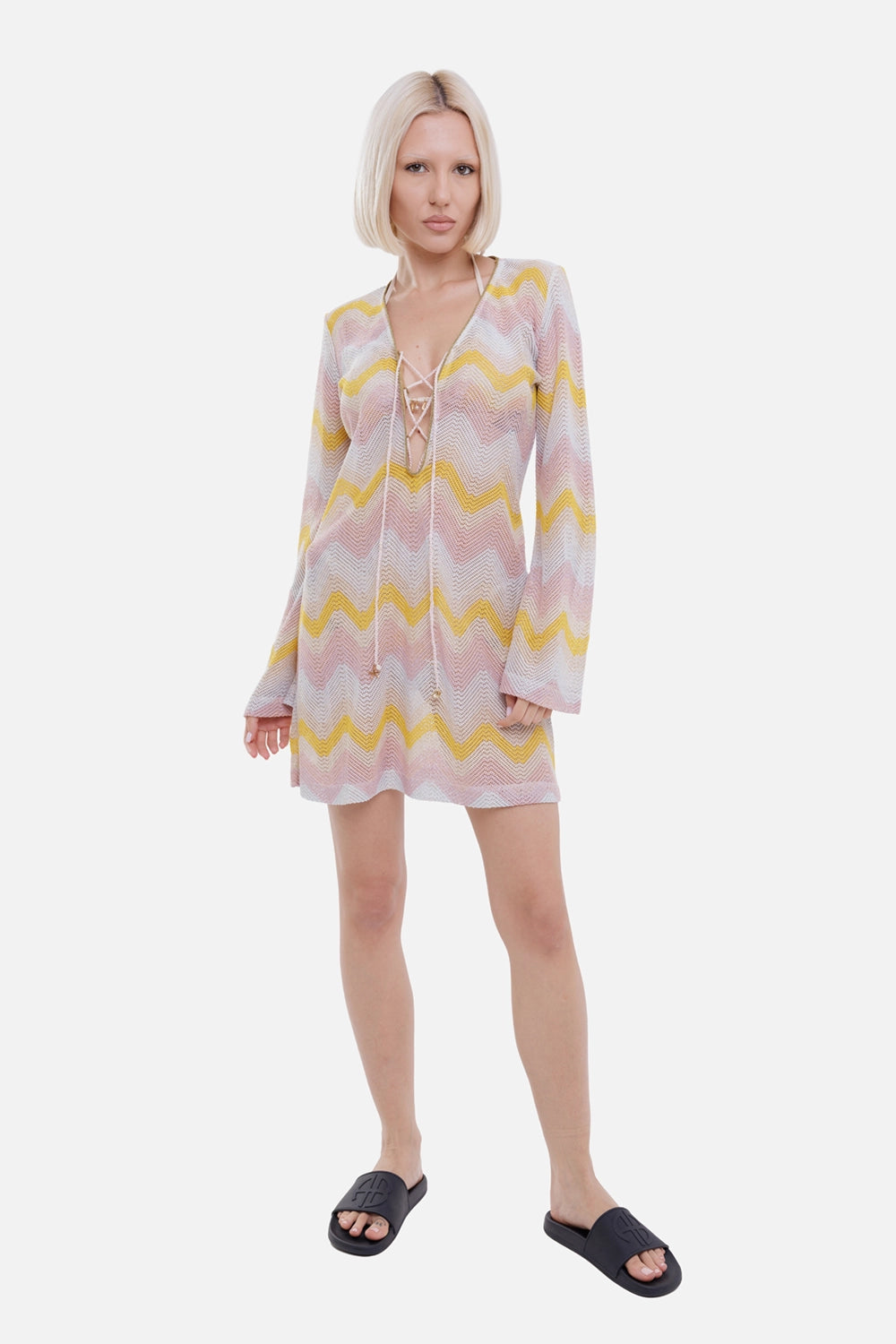 Anjuna women's mini dress in rose blush multirose, on-model full-length view, lace-up neckline and flared sleeves