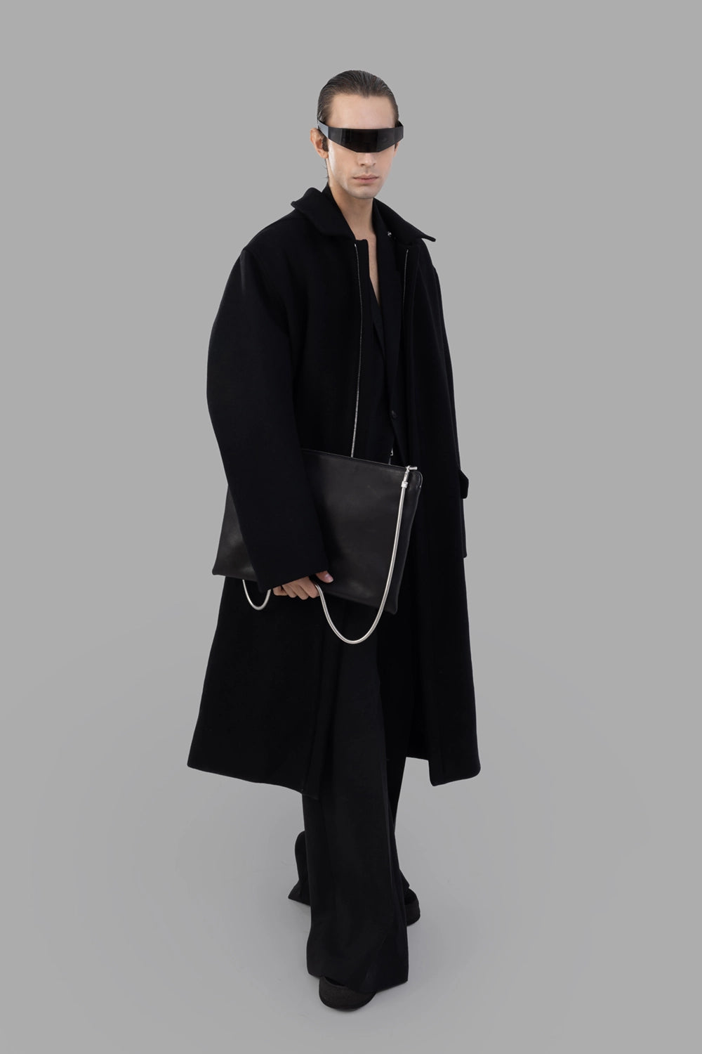 Rick Owens coat in black, on-model full length, oversized cut with concealed front closure