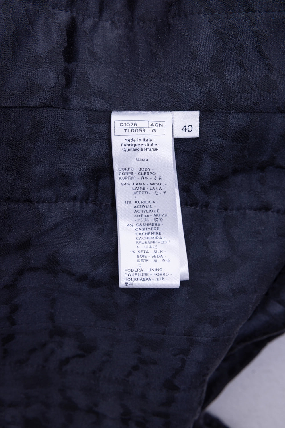 Pre-owned Agnona coat in grey, care tag view, fabric composition and size label